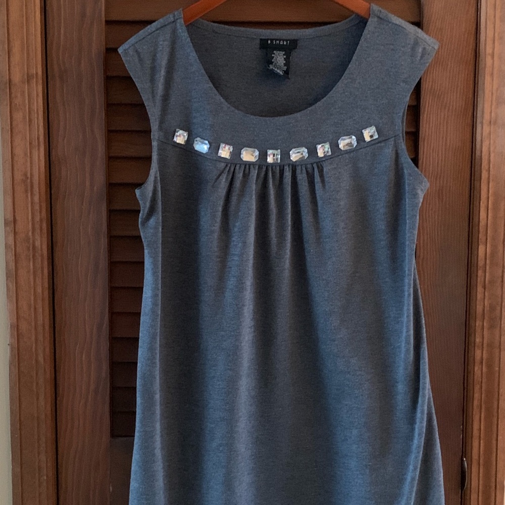 B.Smart shift dress with embellished top